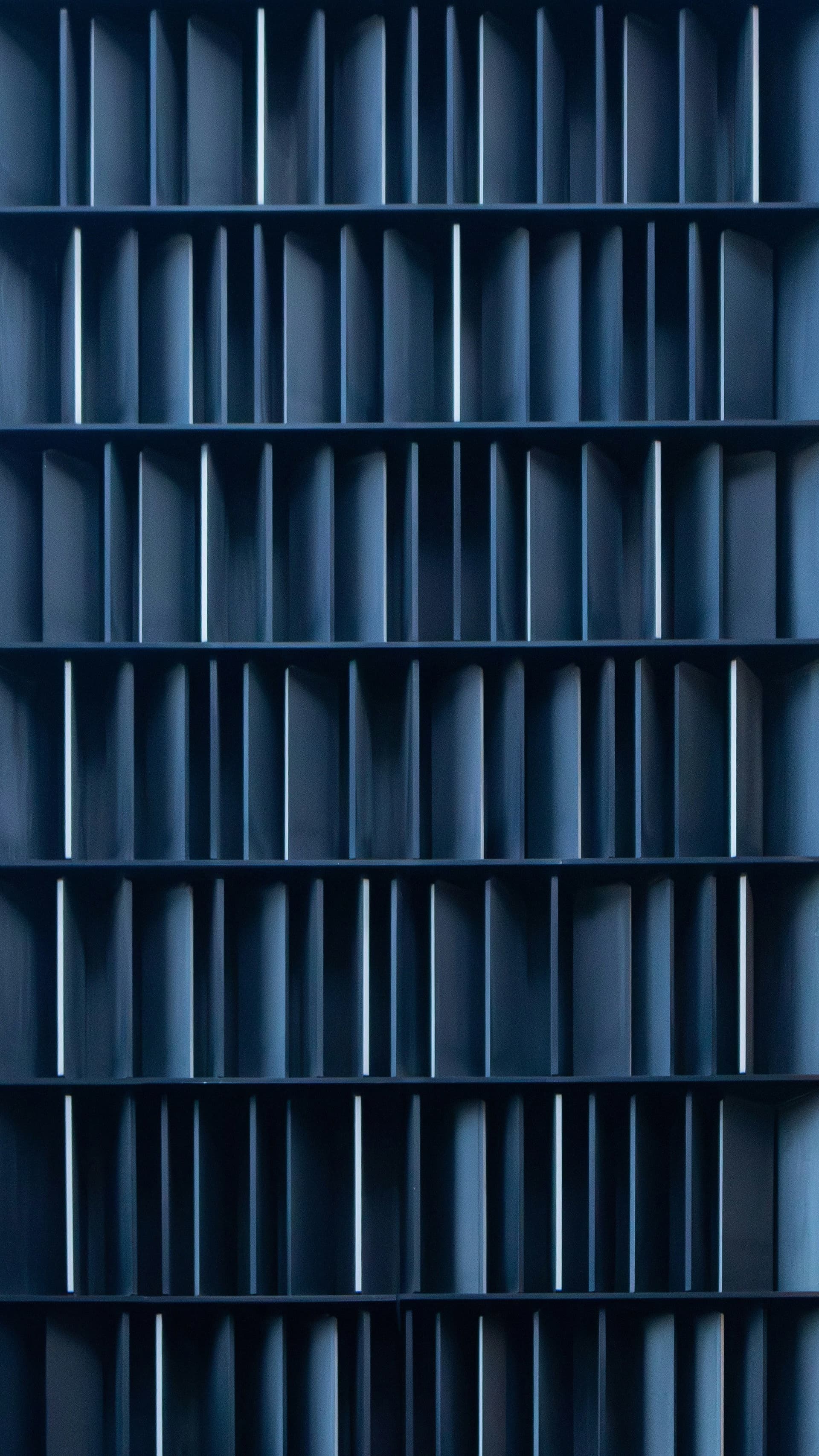Abstract modular shelving arranged in a structured grid